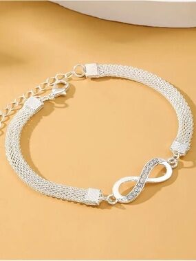 Delicate Silver Infinity Bracelet with Crystal Accents